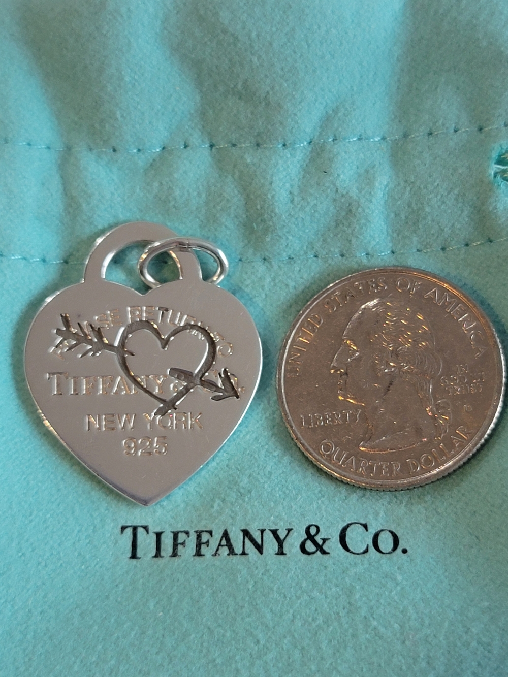 Tiffany & Co. Etched Heart And Arrow Charm Pendant.